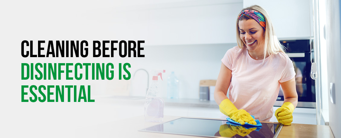 A Woman Cleaning Her Kitchen Before Disinfecting It