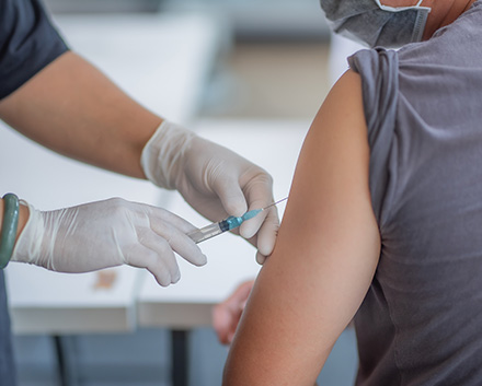 A Person Getting the COVID-19 Vaccine