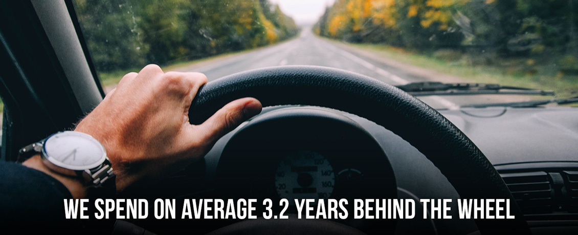 A Person Behind the Wheel Showing That We Spend on Average 3.2 Years Driving